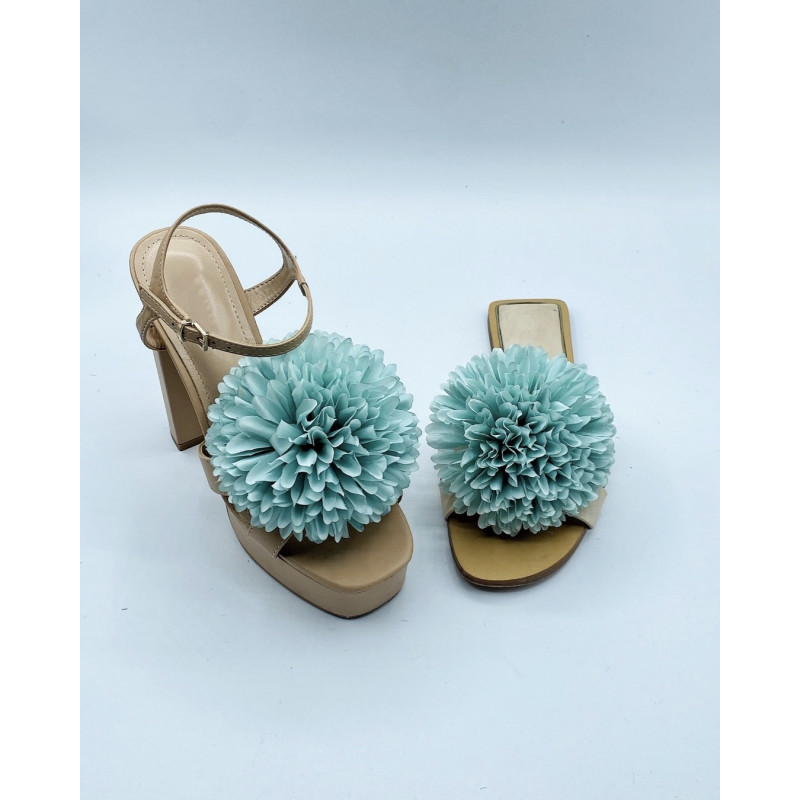 Woman slippers to be at home light blue towel with detail flowers